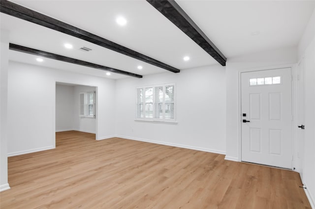 12706 Westleigh Dr, Houston, TX 77077 - foyer with light wood-type flooring, beam ceiling, plenty of natural light, and recessed lighting