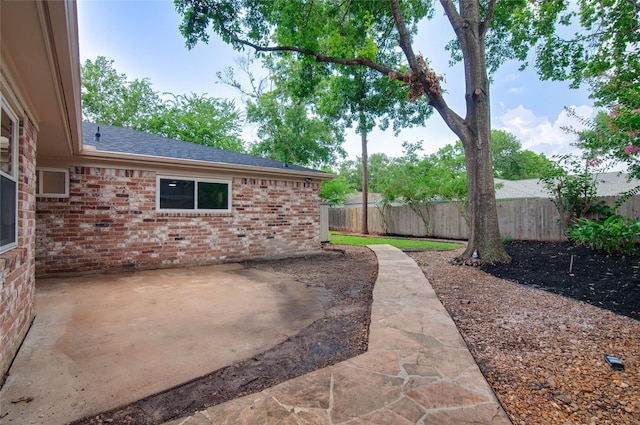 12706 Westleigh Dr, Houston, TX 77077 - fenced backyard featuring a patio area