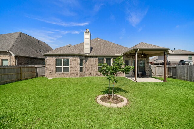3822 Moreland Branch Ln, Katy, TX 77493 - back of house featuring a patio, brick siding, a fenced backyard, and ceiling fan