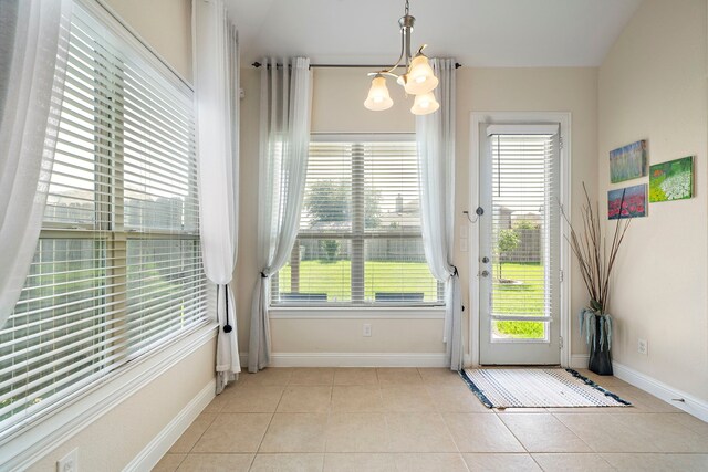 3822 Moreland Branch Ln, Katy, TX 77493 - entryway with a chandelier and light tile patterned floors