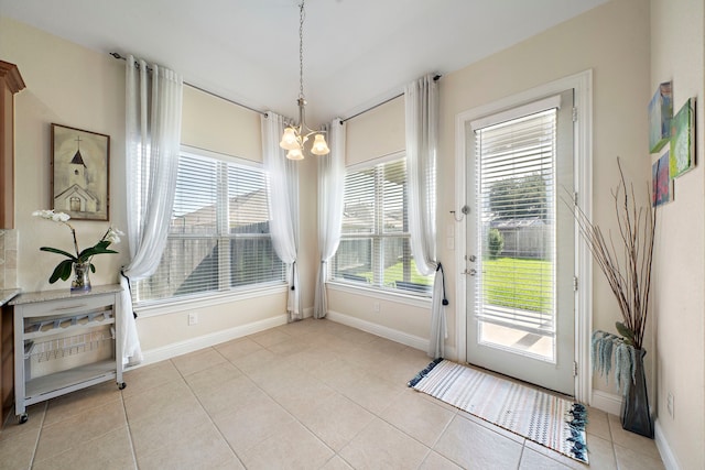 3822 Moreland Branch Ln, Katy, TX 77493 - unfurnished dining area featuring a chandelier and light tile patterned flooring