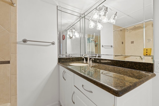 3350 Mccue Rd Unit 1901, Houston, TX 77056 - bathroom featuring curtained shower, vanity, and a chandelier