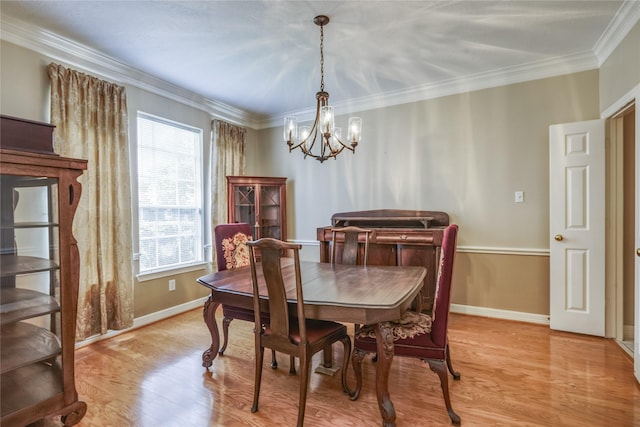 3718 W Pine Brook Way, Houston, TX 77059 - dining room with a chandelier, light wood-style flooring, and crown molding
