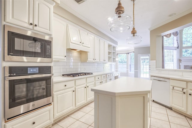 3718 W Pine Brook Way, Houston, TX 77059 - kitchen featuring stainless steel appliances, ornamental molding, light tile patterned flooring, tasteful backsplash, and healthy amount of natural light