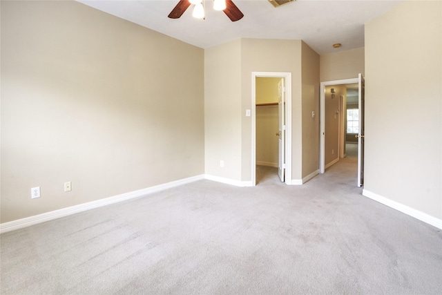 3718 W Pine Brook Way, Houston, TX 77059 - unfurnished bedroom featuring a spacious closet, light colored carpet, a ceiling fan, and a closet