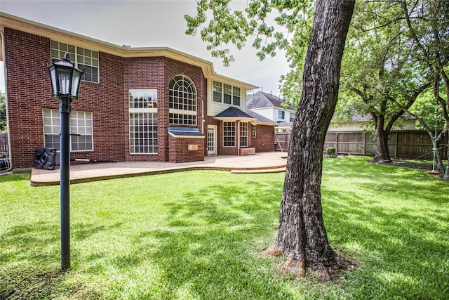 3718 W Pine Brook Way, Houston, TX 77059 - back of property with a patio and brick siding