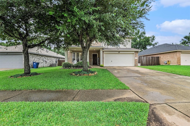 30110 Saw Oaks, Magnolia, TX 77355 - view of front facade featuring brick siding, concrete driveway, and a garage