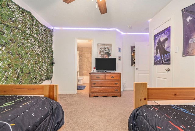 30110 Saw Oaks, Magnolia, TX 77355 - carpeted bedroom featuring ensuite bathroom and a ceiling fan