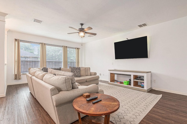30110 Saw Oaks, Magnolia, TX 77355 - living room featuring dark wood-style floors, ceiling fan, and a textured ceiling