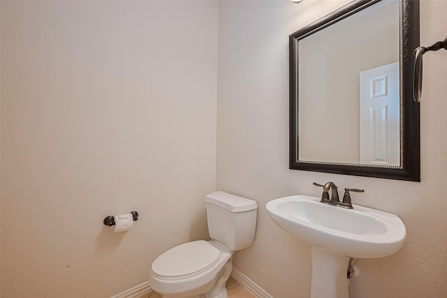 19339 Oxford Haven Dr, Cypress, TX 77433 - half bathroom featuring baseboards and toilet