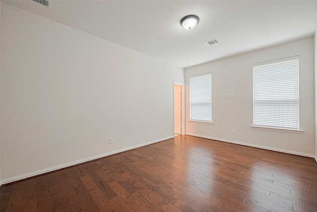 19339 Oxford Haven Dr, Cypress, TX 77433 - empty room featuring dark wood-style floors and baseboards