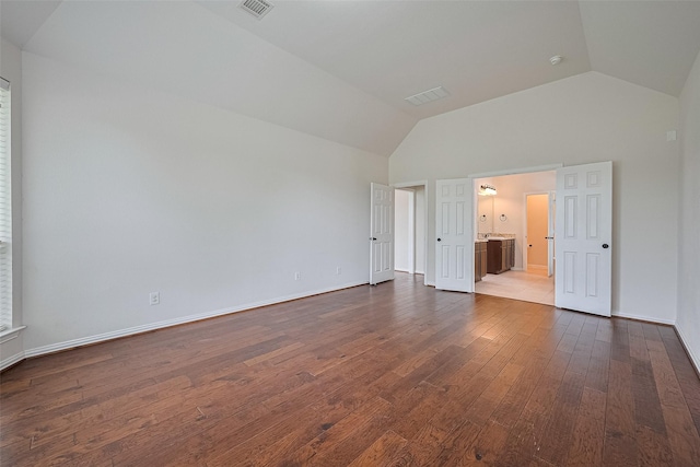 19339 Oxford Haven Dr, Cypress, TX 77433 - spare room featuring dark wood-type flooring and high vaulted ceiling