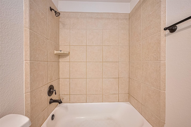 19339 Oxford Haven Dr, Cypress, TX 77433 - bathroom featuring bathing tub / shower combination and toilet