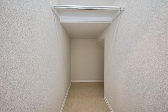 19339 Oxford Haven Dr, Cypress, TX 77433 - walk in closet featuring light tile patterned flooring