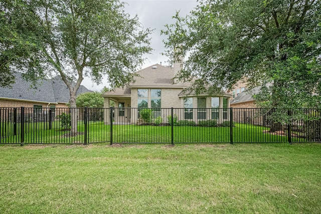 19339 Oxford Haven Dr, Cypress, TX 77433 - rear view of property with stucco siding and a chimney