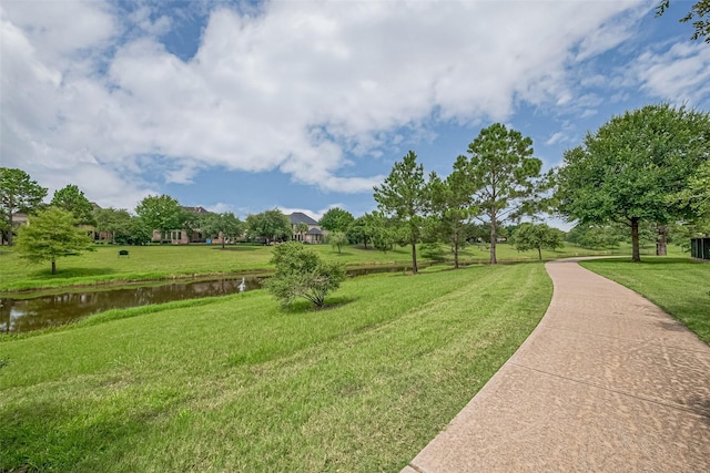 19339 Oxford Haven Dr, Cypress, TX 77433 - view of property's community featuring a water view and a lawn