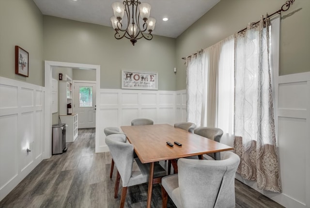 610 S Railroad Ave, Shepherd, TX 77371 - dining room with a decorative wall, a wainscoted wall, a chandelier, dark wood-type flooring, and recessed lighting