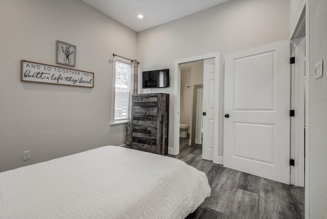 610 S Railroad Ave, Shepherd, TX 77371 - bedroom featuring dark wood-style flooring, ensuite bath, and recessed lighting