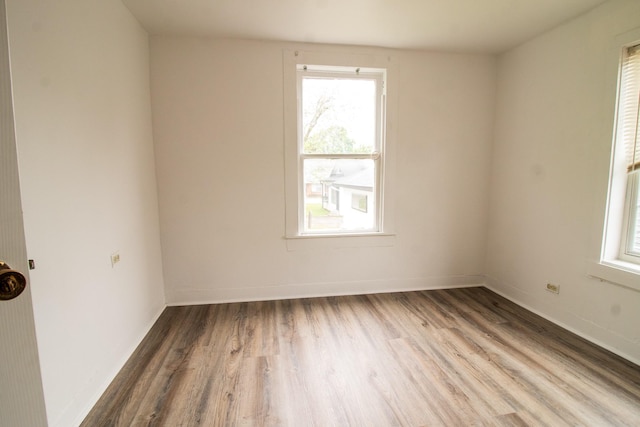 4918 Leffingwell St, Houston, TX 77026 - spare room with wood finished floors