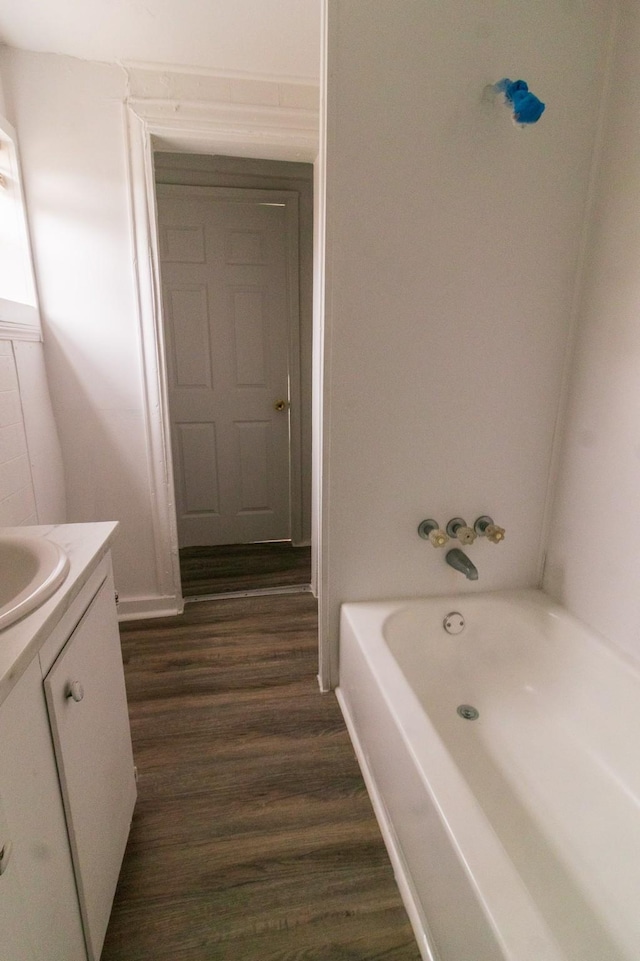 4918 Leffingwell St, Houston, TX 77026 - bathroom featuring vanity and wood finished floors