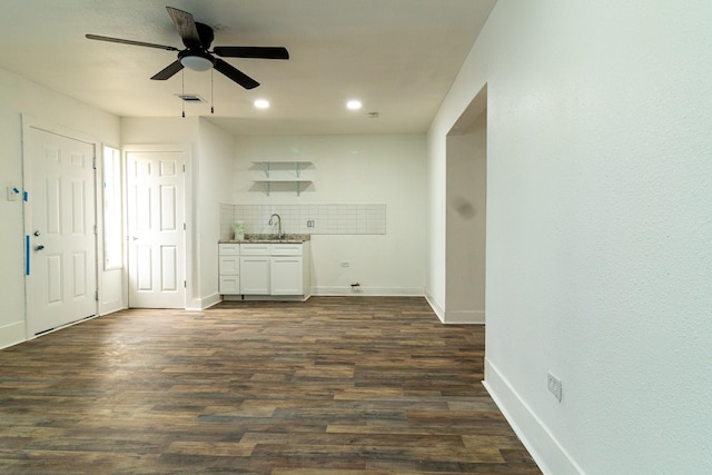 4918 Leffingwell St, Houston, TX 77026 - unfurnished living room featuring wet bar, dark wood finished floors, a ceiling fan, and recessed lighting