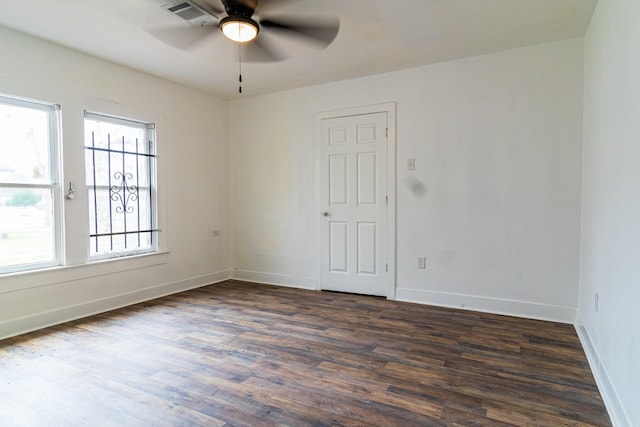 4918 Leffingwell St, Houston, TX 77026 - unfurnished room featuring dark wood-style flooring and a ceiling fan