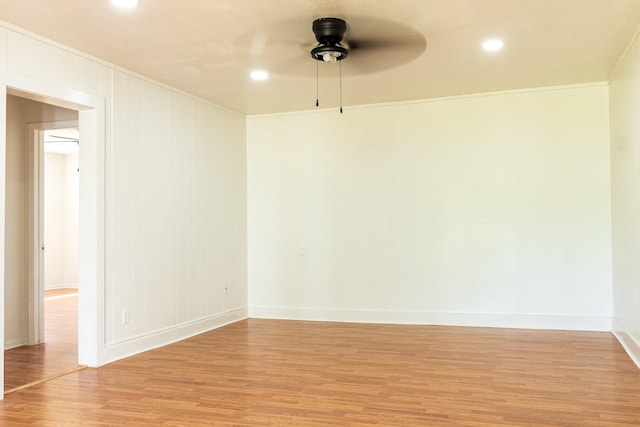 4918 Leffingwell St, Houston, TX 77026 - spare room featuring ceiling fan, light wood-style flooring, ornamental molding, and recessed lighting