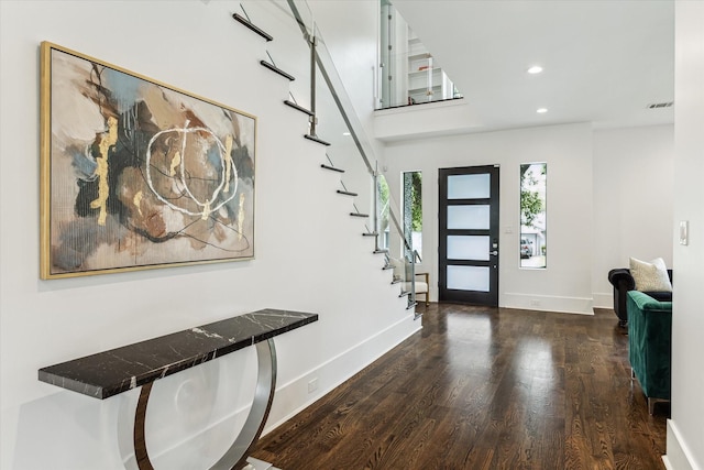 1010 Waltway Dr, Houston, TX 77008 - entryway featuring wood finished floors, stairway, and recessed lighting