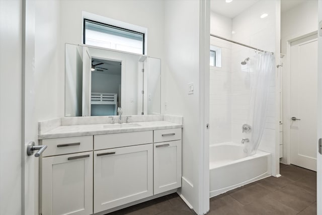 1010 Waltway Dr, Houston, TX 77008 - bathroom with healthy amount of natural light, shower / bath combo, vanity, and tile patterned flooring