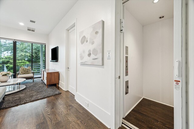 1010 Waltway Dr, Houston, TX 77008 - corridor featuring dark wood finished floors and recessed lighting