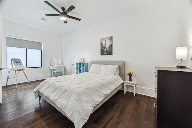 1010 Waltway Dr, Houston, TX 77008 - bedroom featuring dark wood finished floors and ceiling fan
