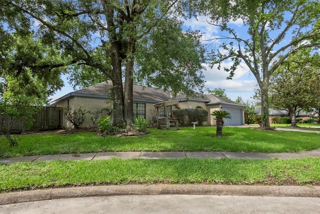 14202 Double Pine Dr, Houston, TX 77015 - view of front of home featuring a garage and brick siding