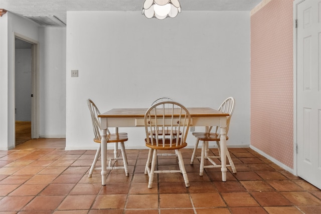14202 Double Pine Dr, Houston, TX 77015 - dining room featuring wallpapered walls and light tile patterned flooring