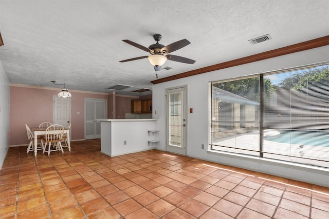 14202 Double Pine Dr, Houston, TX 77015 - living area with light tile patterned floors, ceiling fan, a textured ceiling, and ornamental molding