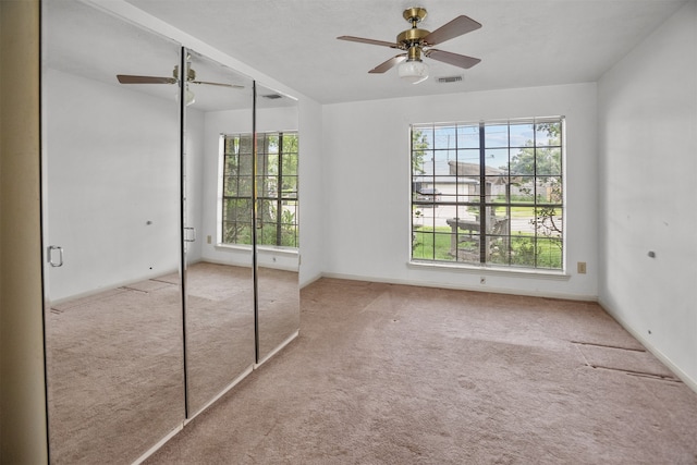 14202 Double Pine Dr, Houston, TX 77015 - unfurnished bedroom with carpet flooring, a closet, and ceiling fan