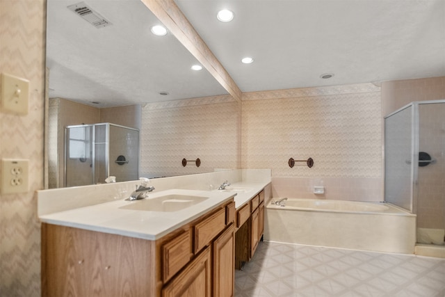 14202 Double Pine Dr, Houston, TX 77015 - bathroom with a stall shower, double vanity, a garden tub, recessed lighting, and wallpapered walls