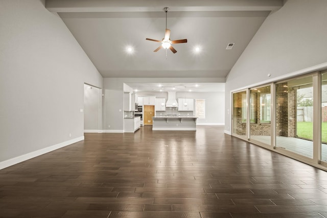 10519 Lantana Pass, Missouri City, TX 77459 - unfurnished living room featuring high vaulted ceiling, a ceiling fan, dark wood-type flooring, and recessed lighting