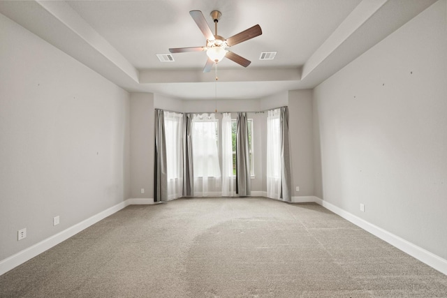 10519 Lantana Pass, Missouri City, TX 77459 - unfurnished room with a ceiling fan, a raised ceiling, and light colored carpet