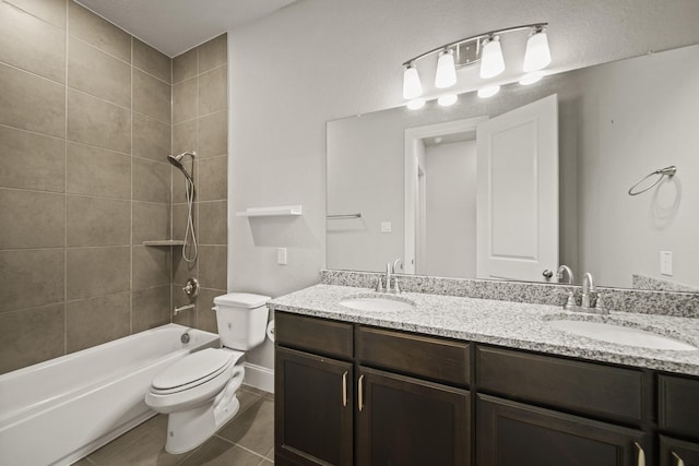 10519 Lantana Pass, Missouri City, TX 77459 - bathroom with double vanity, tile patterned floors, and shower / bath combination