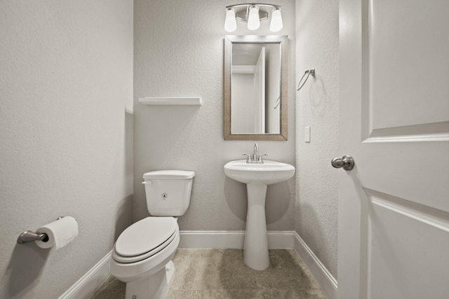 10519 Lantana Pass, Missouri City, TX 77459 - bathroom with toilet and baseboards