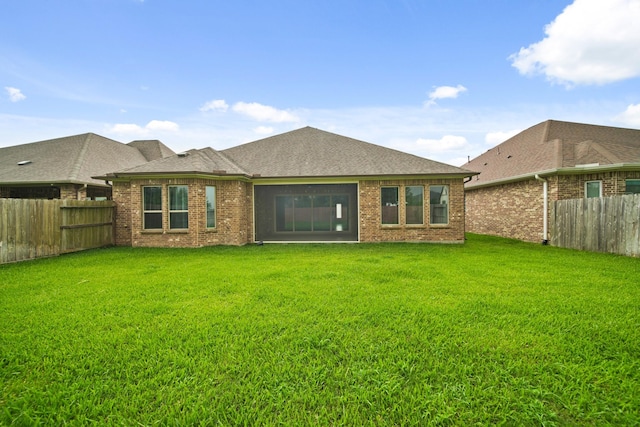 10519 Lantana Pass, Missouri City, TX 77459 - rear view of property with a fenced backyard and brick siding