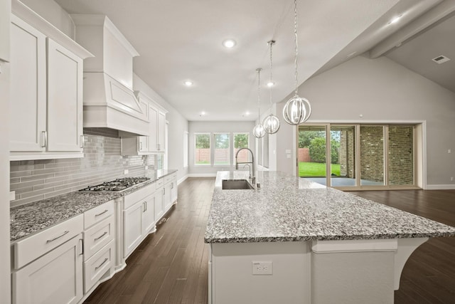10519 Lantana Pass, Missouri City, TX 77459 - kitchen with stainless steel gas stovetop, white cabinetry, dark wood-style flooring, and recessed lighting
