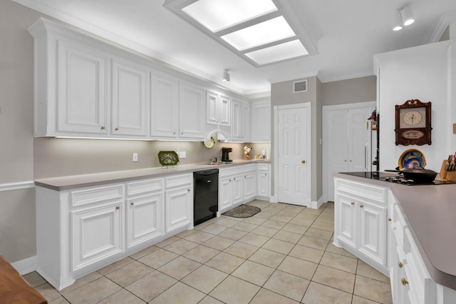 4723 Cashel Castle Dr, Houston, TX 77069 - kitchen featuring black appliances, light tile patterned flooring, white cabinetry, light countertops, and crown molding