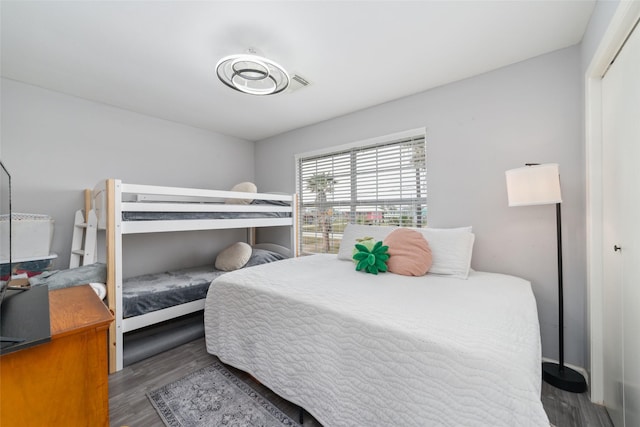 610 Seashell Dr, Freeport, TX 77541 - bedroom featuring wood finished floors and a closet