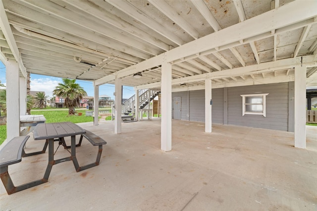 610 Seashell Dr, Freeport, TX 77541 - view of patio / terrace featuring stairway