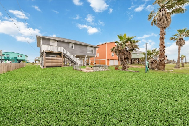 610 Seashell Dr, Freeport, TX 77541 - rear view of house with stairway