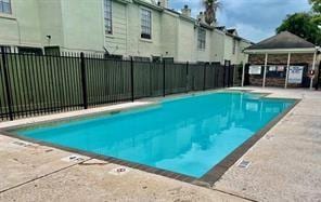 12656 Windsor Village Dr Unit 2656, Houston, TX 77071 - community pool featuring a gazebo and a patio