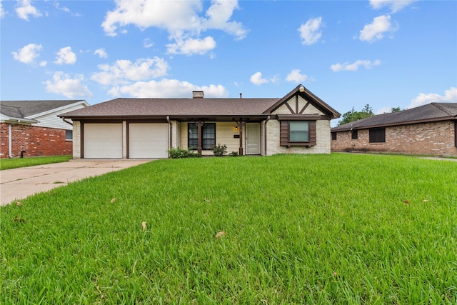 14115 Lantern Ln, Houston, TX 77015 - view of front facade with an attached garage, a front yard, brick siding, and driveway