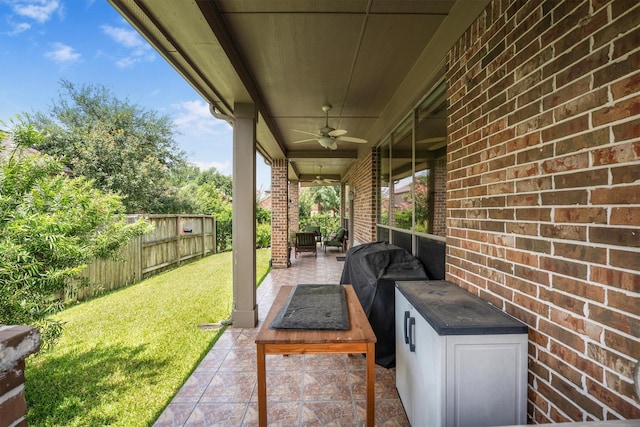 18419 W Willow Oak Bend Dr, Cypress, TX 77433 - fenced backyard featuring a ceiling fan, a patio area, area for grilling, and outdoor lounge area