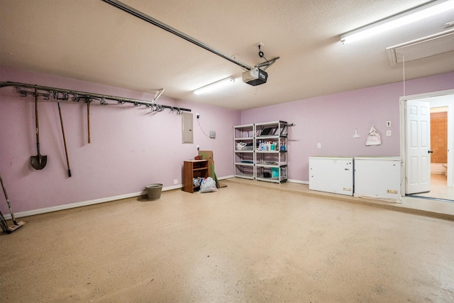 18419 W Willow Oak Bend Dr, Cypress, TX 77433 - garage with a garage door opener, fridge, and electric panel